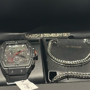 New in Box Ed Hardy Men’s Black Face Wrist Watch plus Necklace and Bracelet.